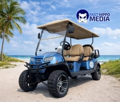 Blue golf cart parked on a sandy beach